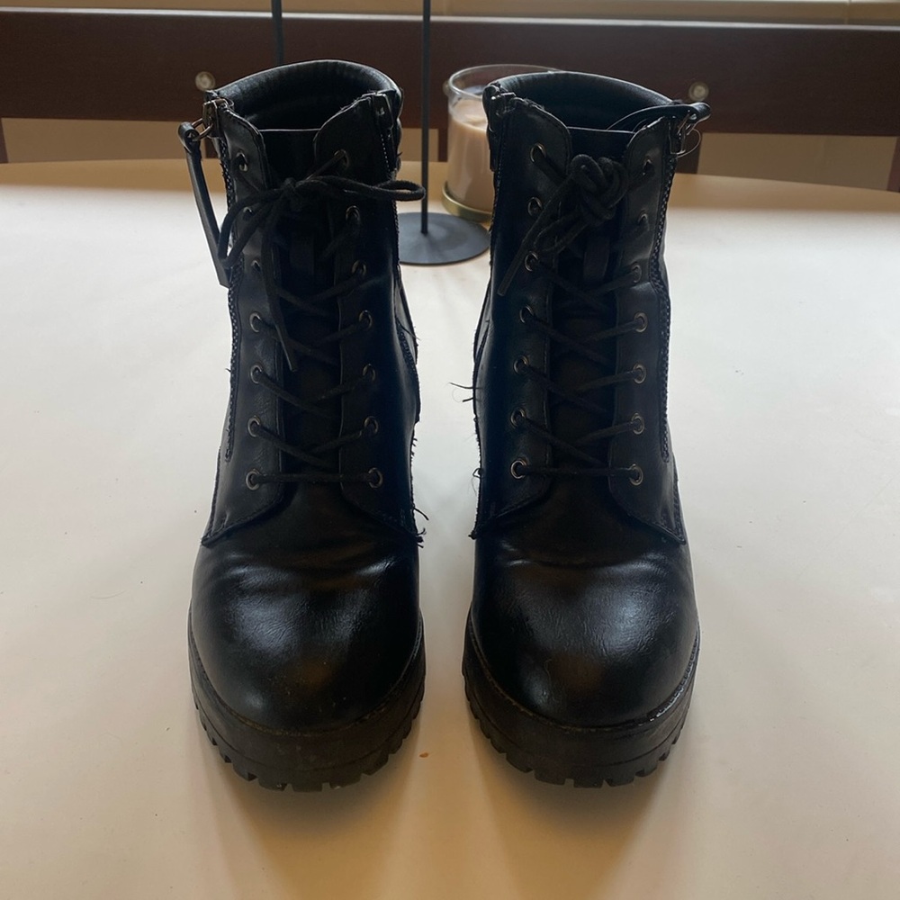 Black healed combat boots